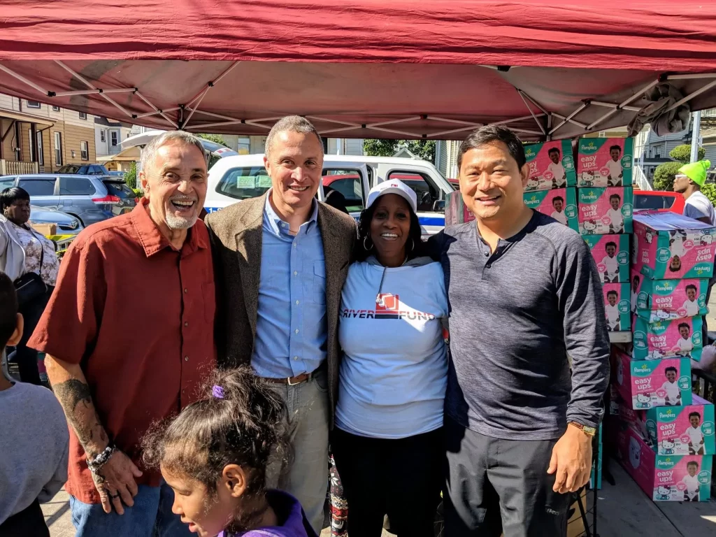 Harold Ford Jr. with his team