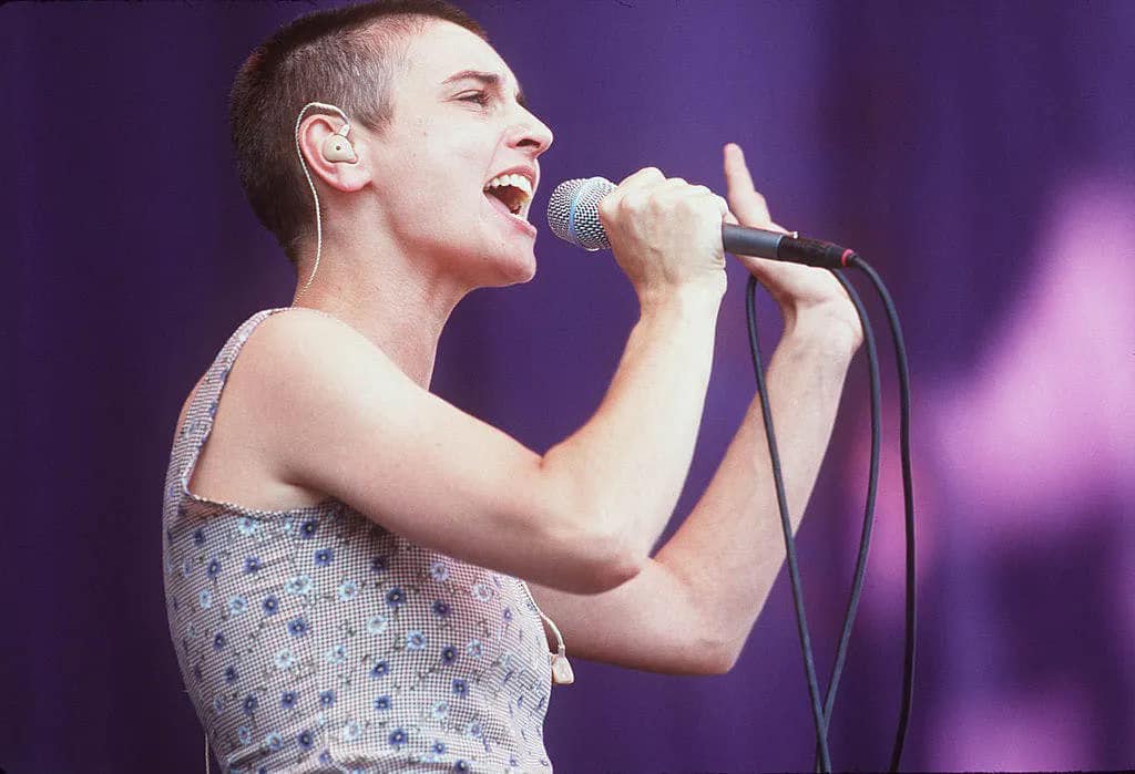 Sinead O'Connor singing on stage