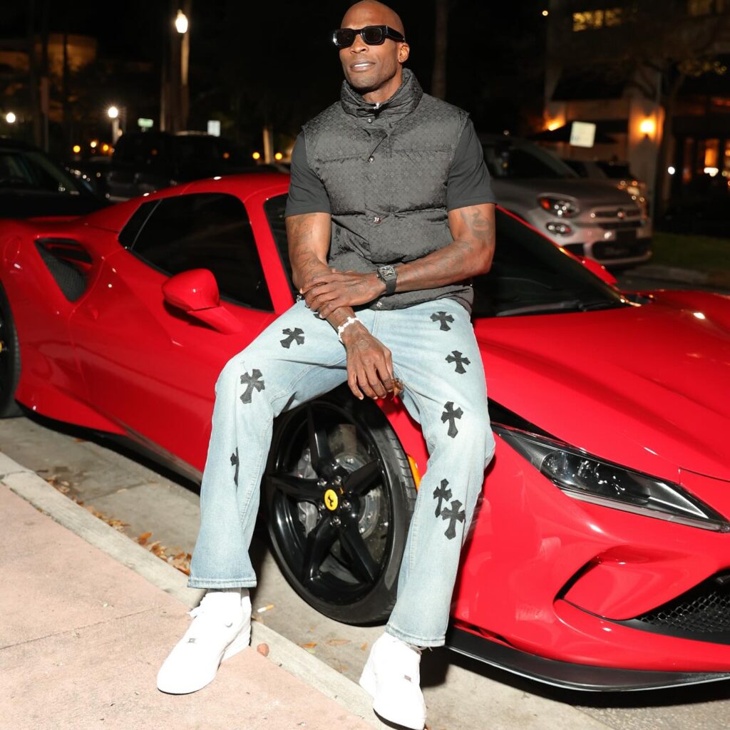 Chad Ochocinco with his car