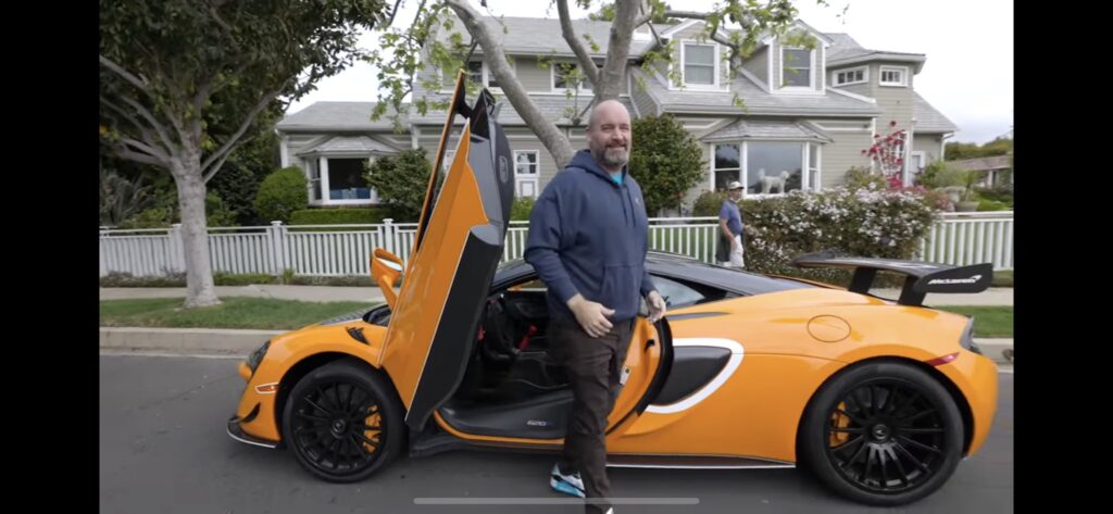 Tom Segura with his car