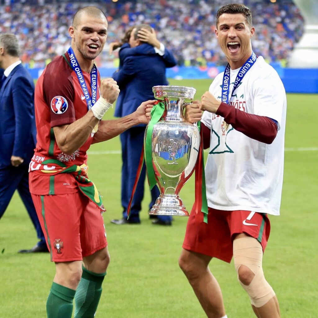 Cristiano Ronaldo with Pepe with Euro Cup